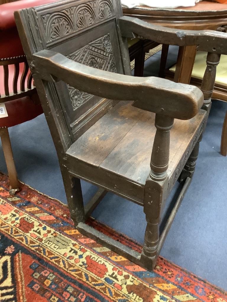 An oak Wainscot chair, width 59cm, depth 50cm, height 86cm